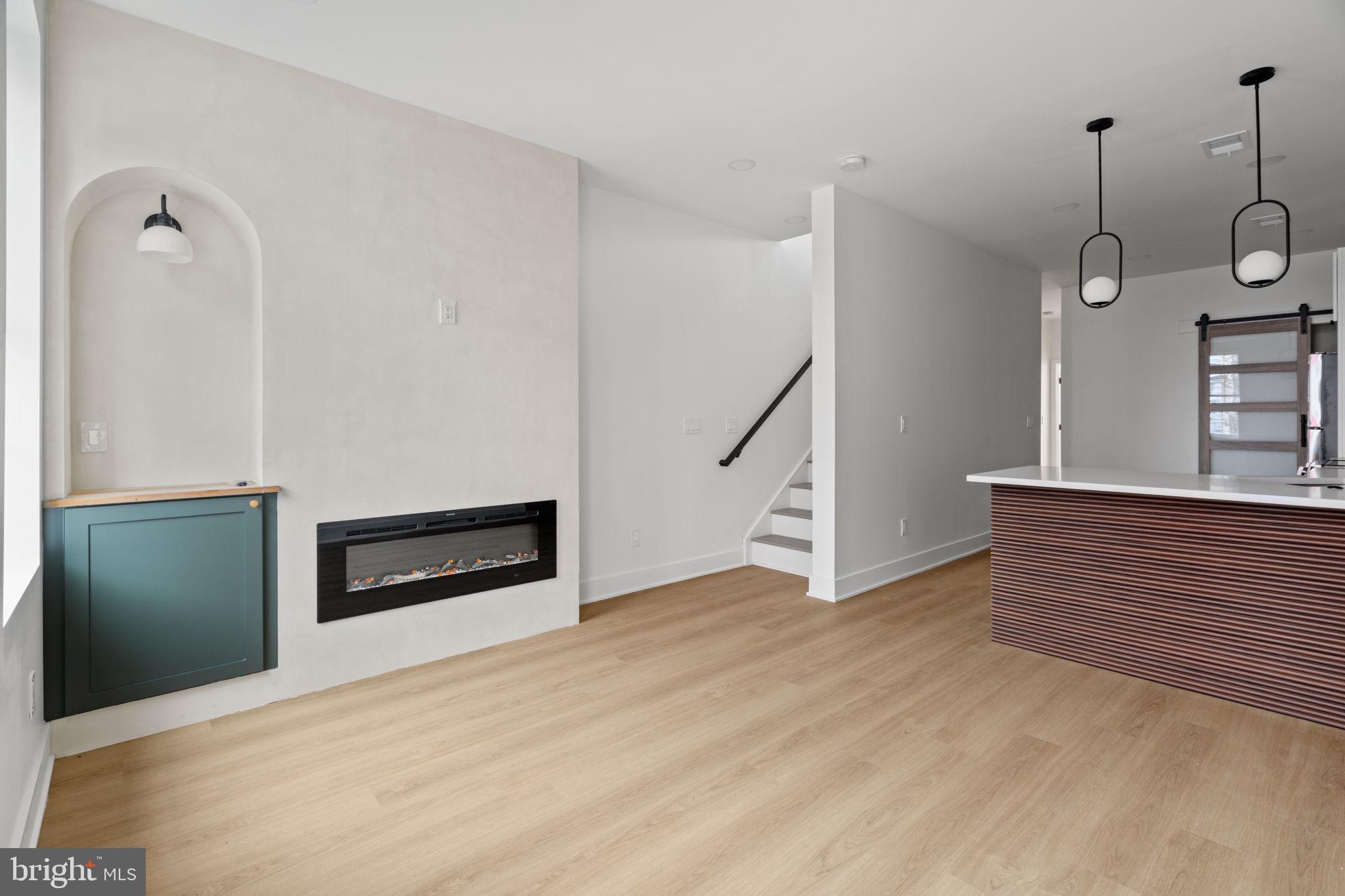 2410 Nicholas Street Philadelphia, PA 19121 - Photo 6 of 55 a view of a livingroom with wooden floor