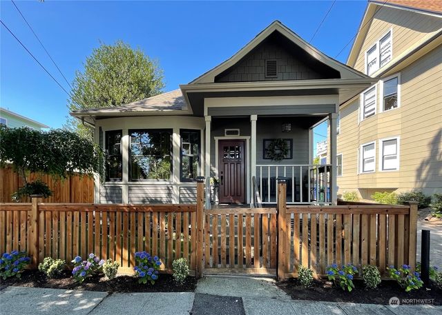 a view of a house with a small garden