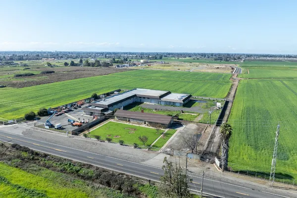 an aerial view of a golf course with a big yard