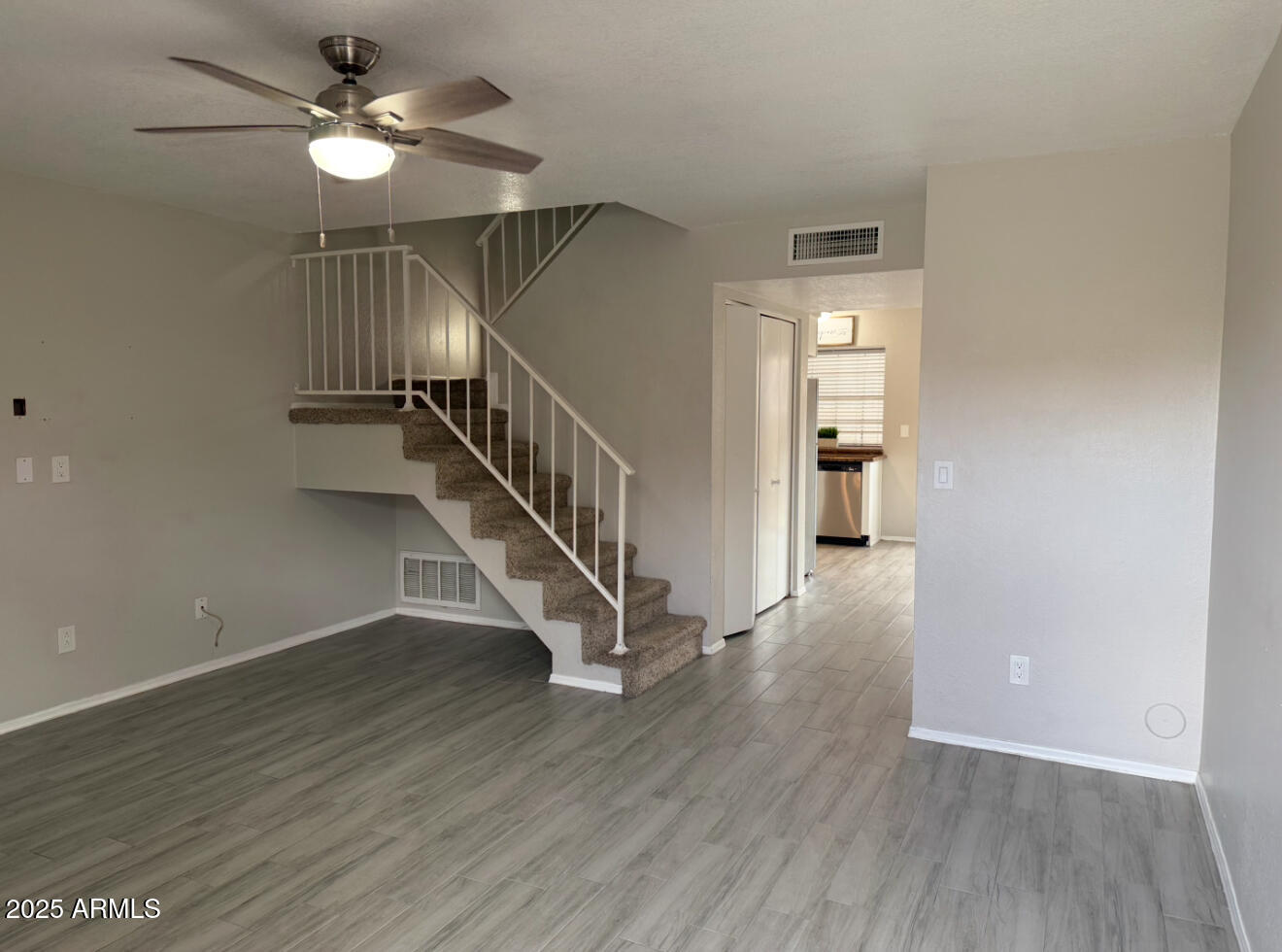 7977 West Wacker Road, Unit 249 Peoria, AZ 85381 - Photo 7 of 17 a view of entryway with wooden floor