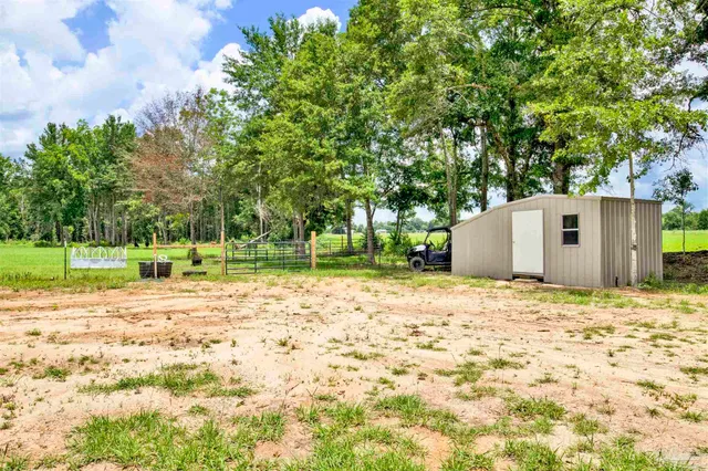 a house with trees in front of it