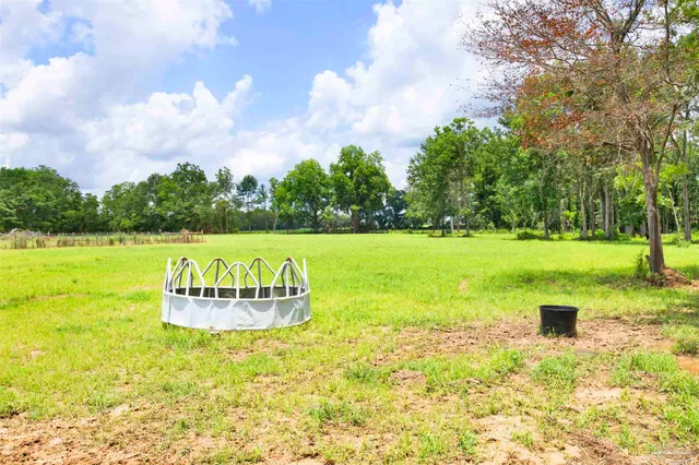 a view of a house with a big yard
