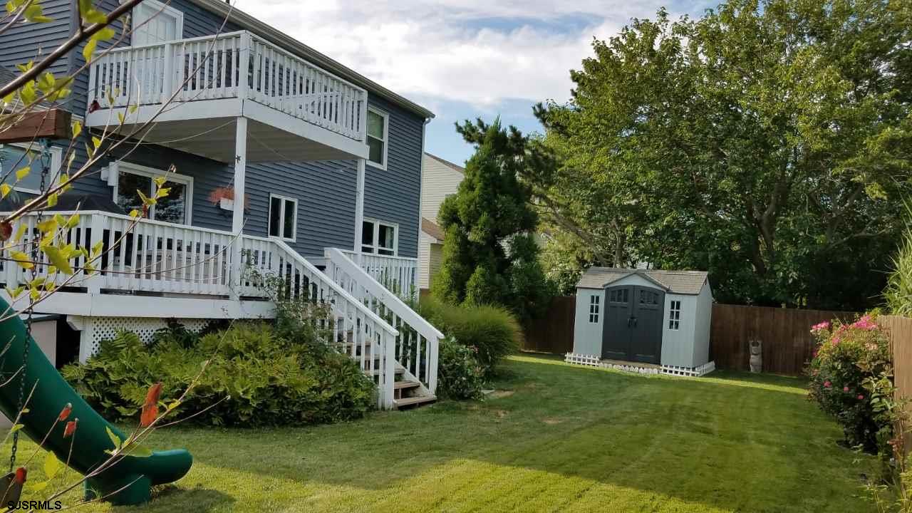 211 Hagen Road Brigantine, NJ 08203 - Photo 19 of 24 a view of a house with a yard