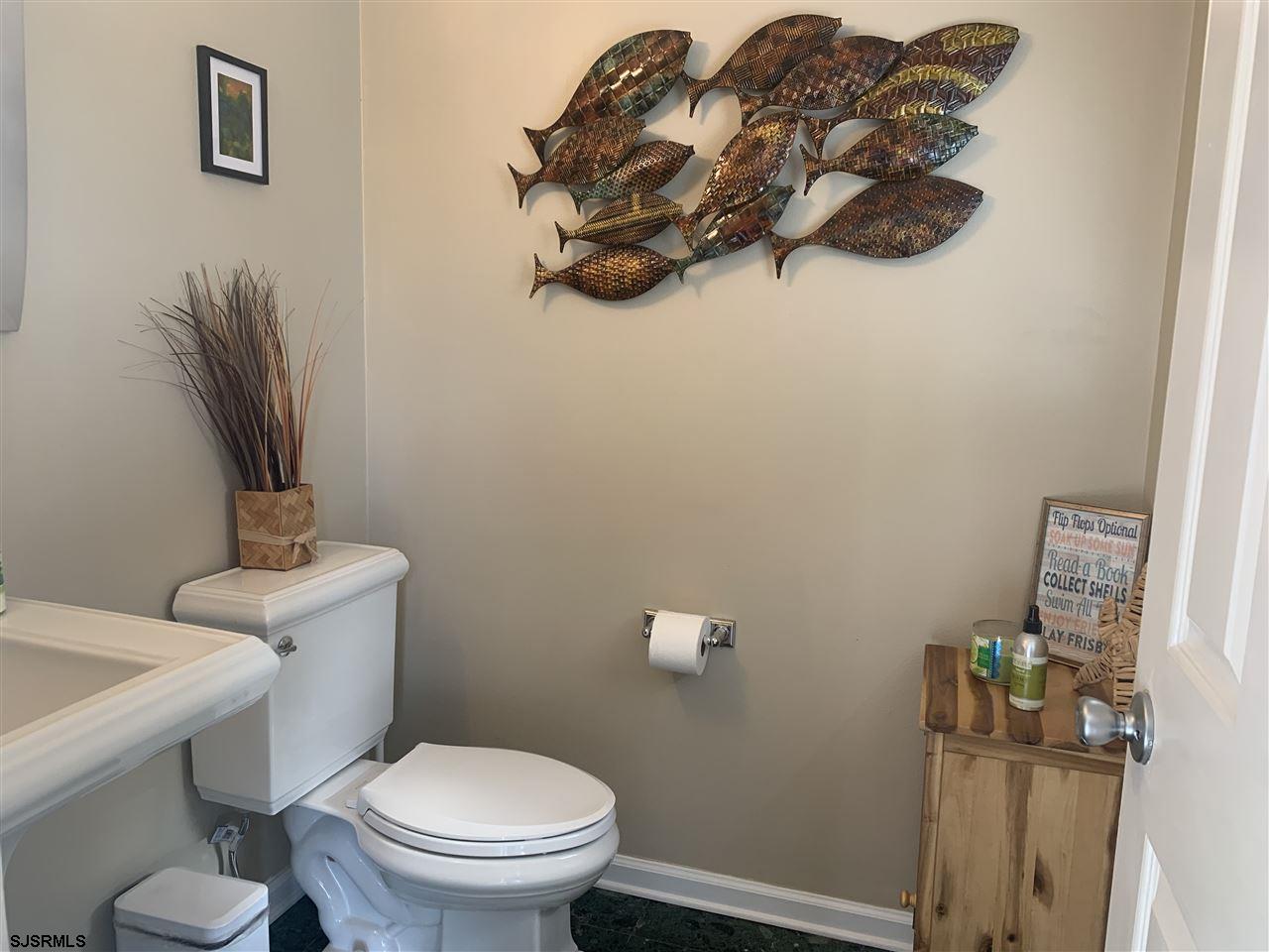 211 Hagen Road Brigantine, NJ 08203 - Photo 8 of 24 a bathroom with a toilet and a sink