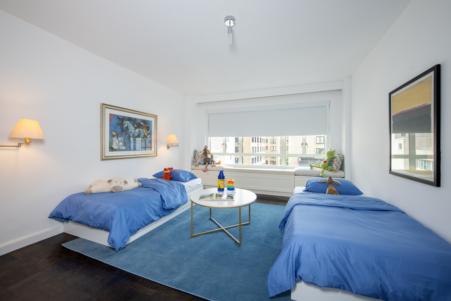799 Park Avenue, Unit 9A Manhattan, NY 10021 - Photo 12 of 14 a living room with furniture and a window