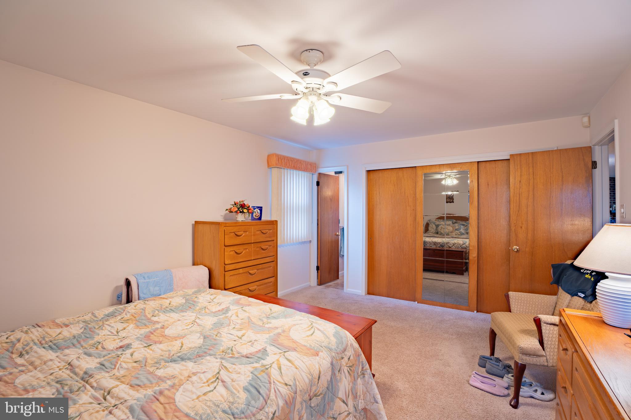 1776 1st Street Langhorne, PA 19047 - Photo 12 of 23 a bedroom with a bed and a chandelier