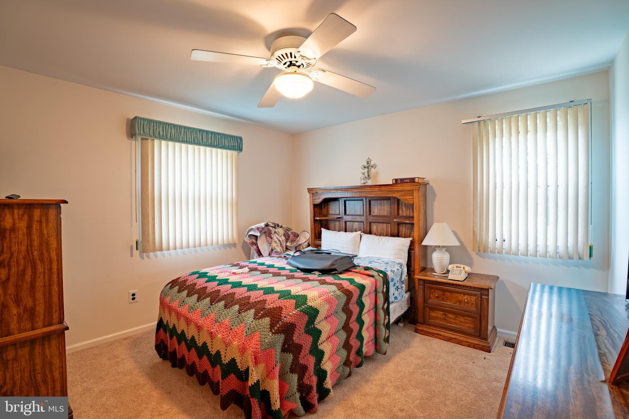 1776 1st Street Langhorne, PA 19047 - Photo 16 of 23 a bedroom with a bed and a table