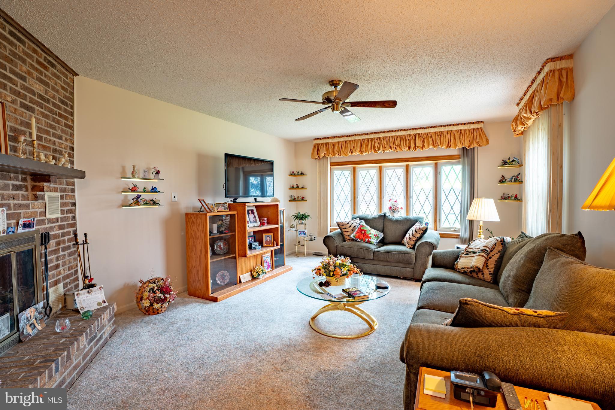 1776 1st Street Langhorne, PA 19047 - Photo 4 of 23 a living room with furniture and a flat screen tv