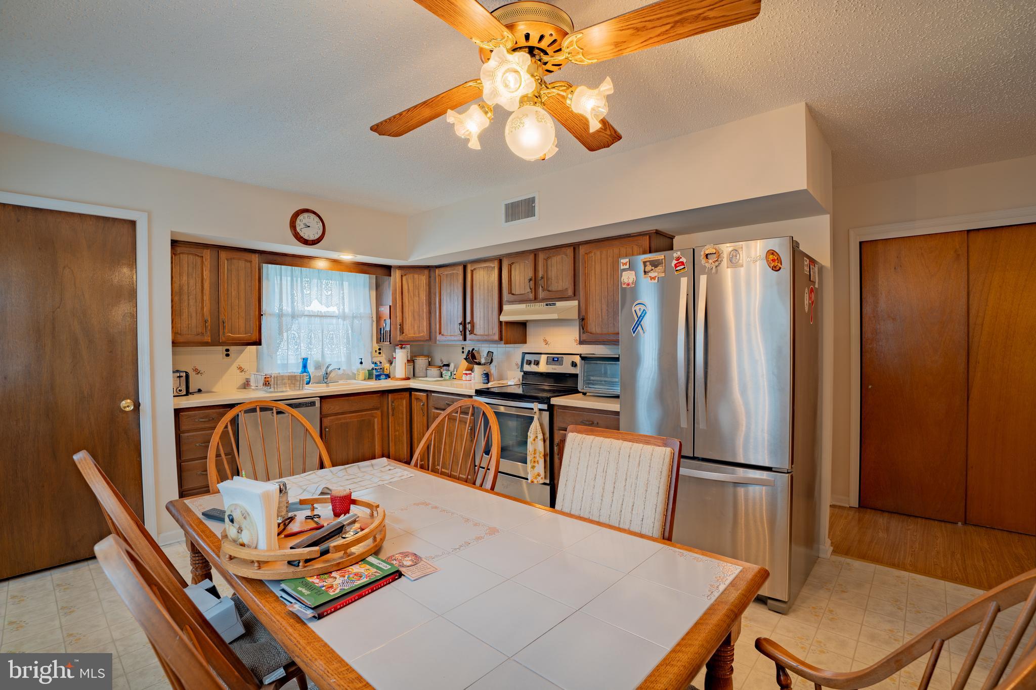 1776 1st Street Langhorne, PA 19047 - Photo 10 of 23 a view of a dining room with furniture window and wooden floor