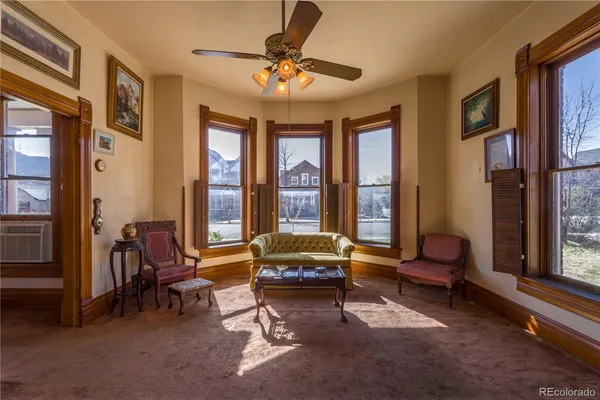 a view of a kitchen with furniture and a window