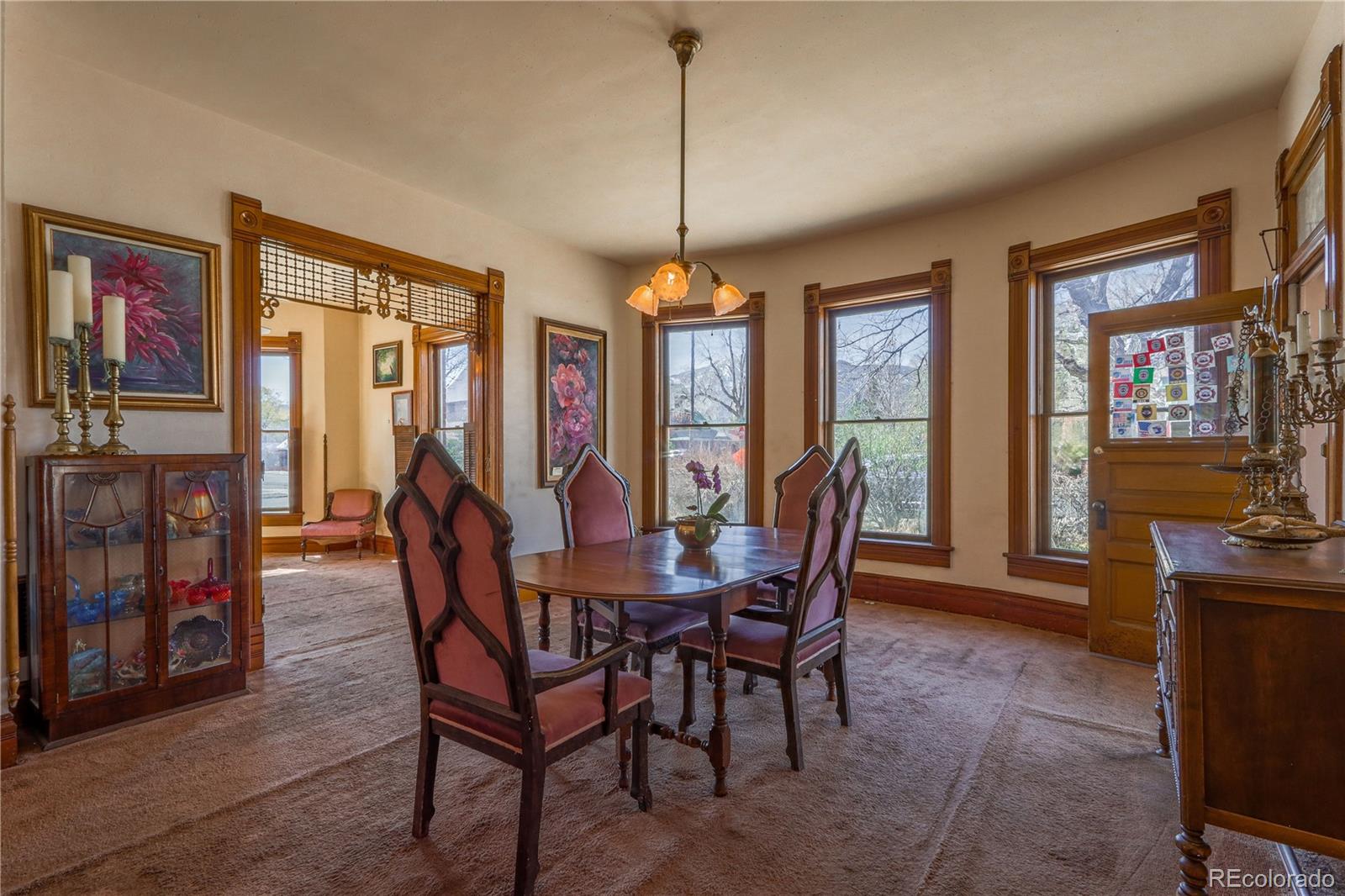 846 F Street Salida, CO 81201 - Photo 17 of 43 a dining room with furniture a chandelier and window