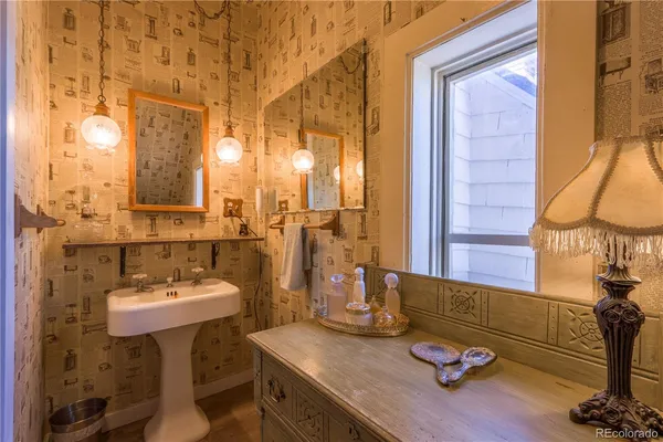 a room with gym equipment and a mirror