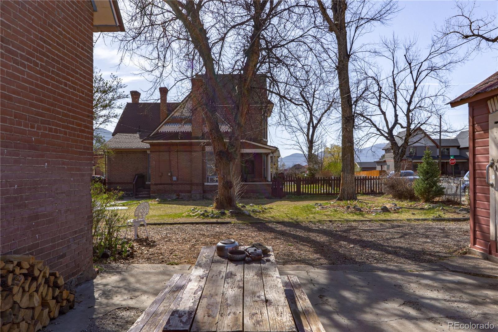 846 F Street Salida, CO 81201 - Photo 6 of 43 a view of a yard with large trees