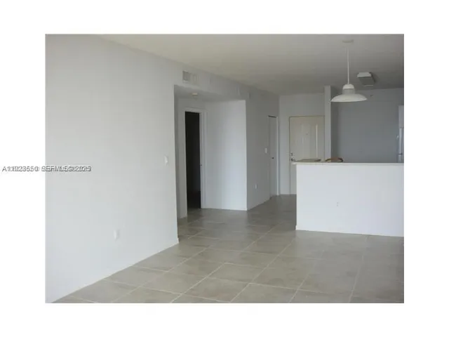 a living room with a wooden floor