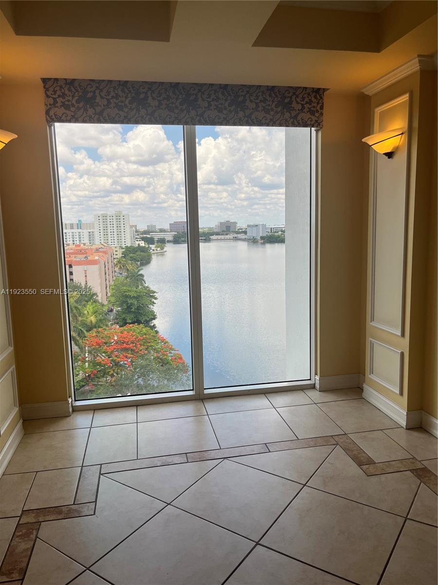 5099 Northwest 7th Street, Unit 1005 Miami, FL 33126 - Photo 9 of 35 a view of a room that has a large window