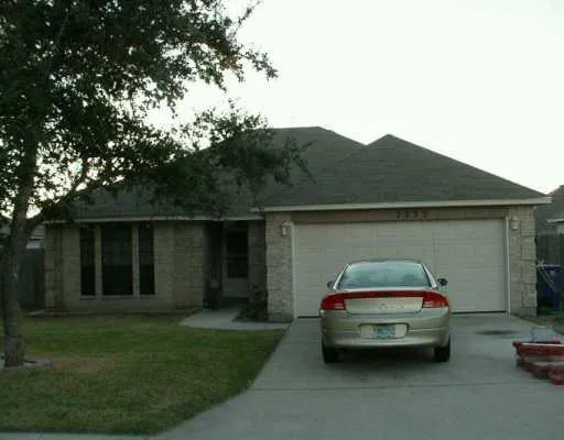 a car parked in front of a house