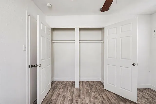 an empty room with closet