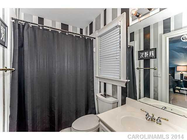 500 South Sharon Amity Road Charlotte, NC 28211 - Photo 11 of 16 a view of a bedroom from the hallway