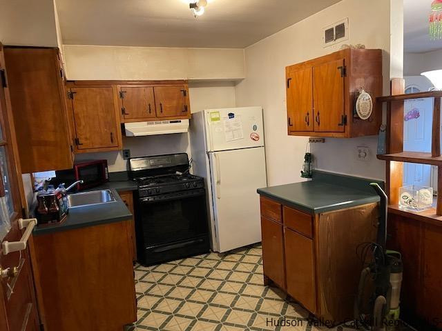 1248 Old Post Road New Paltz, NY 12561 - Photo 8 of 15 a kitchen with a refrigerator sink and stove