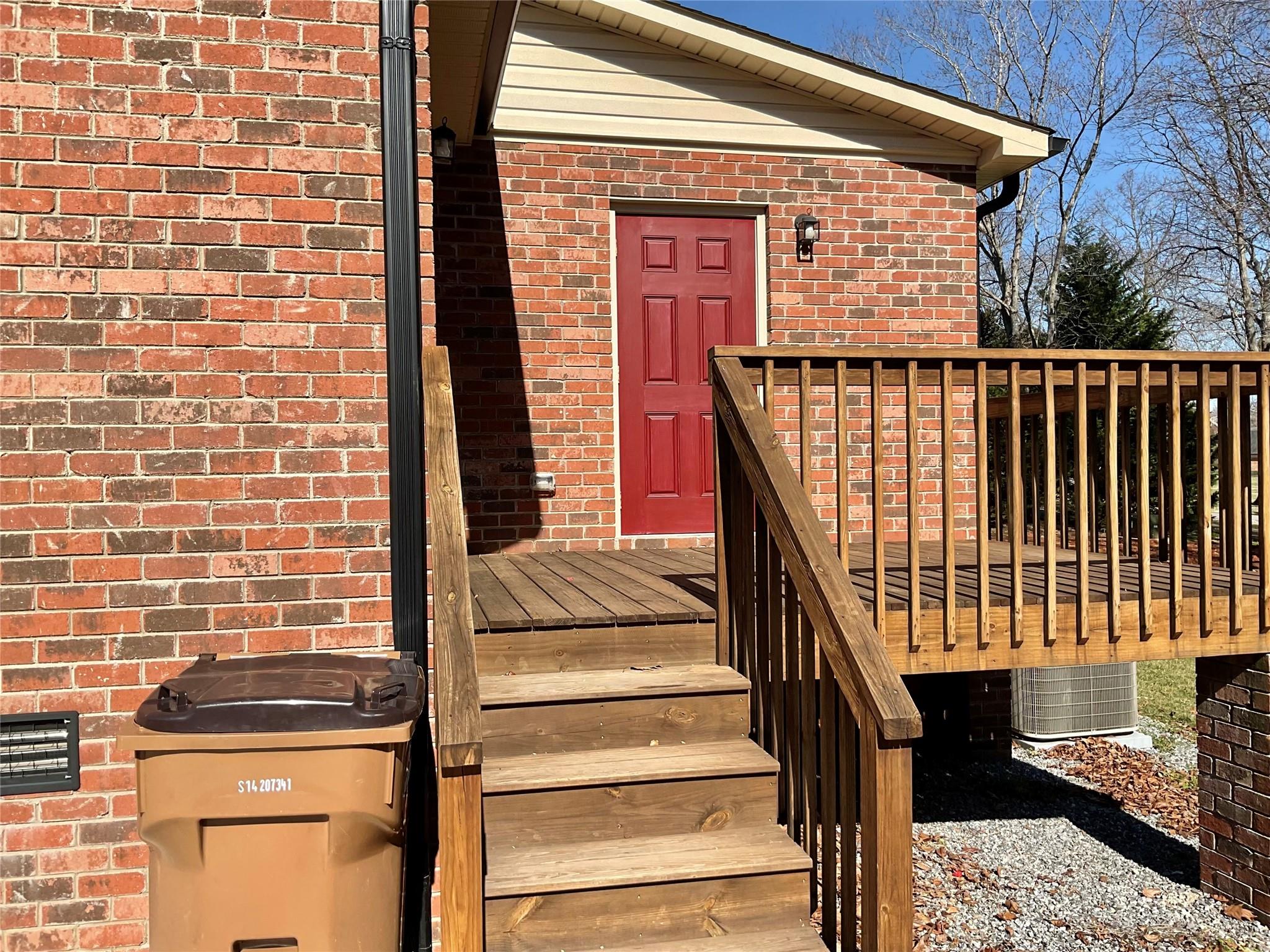 1285 Janice Road Lincolnton, NC 28092 - Photo 2 of 19 a front view of a house with wooden stairs