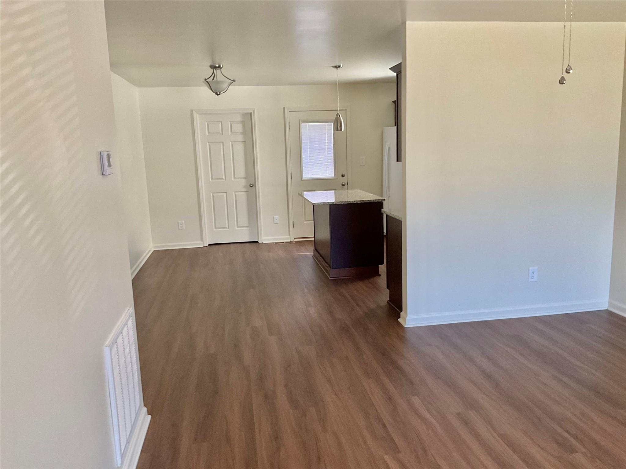 1285 Janice Road Lincolnton, NC 28092 - Photo 7 of 19 a view of a room with wooden floor and a sink