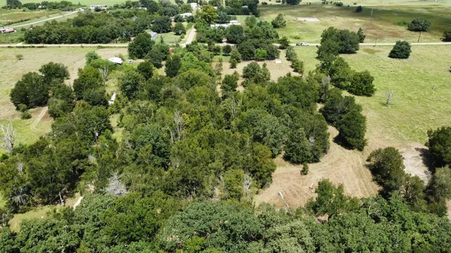 a view of a lake with a yard