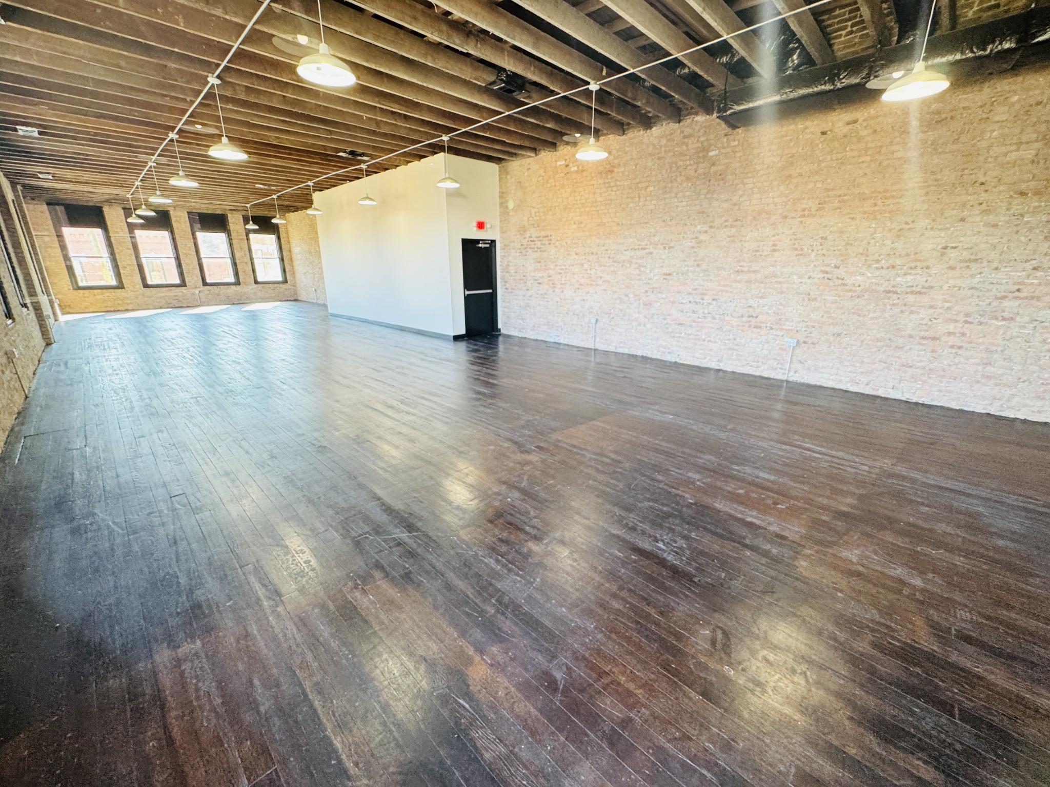 117 East Main Street Lebanon, TN 37087 - Photo 2 of 14 a view of water heater room with wooden floor