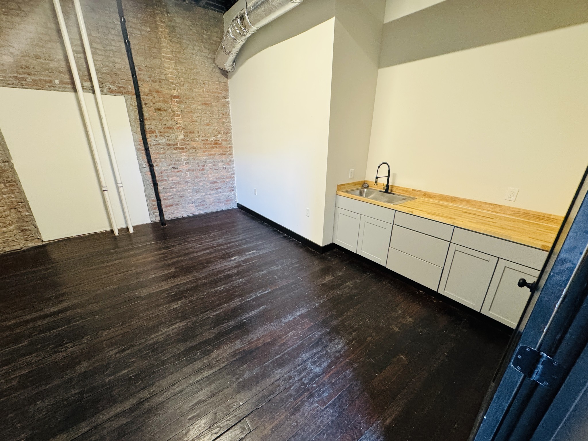 117 East Main Street Lebanon, TN 37087 - Photo 6 of 14 a view of an empty room and wooden floor