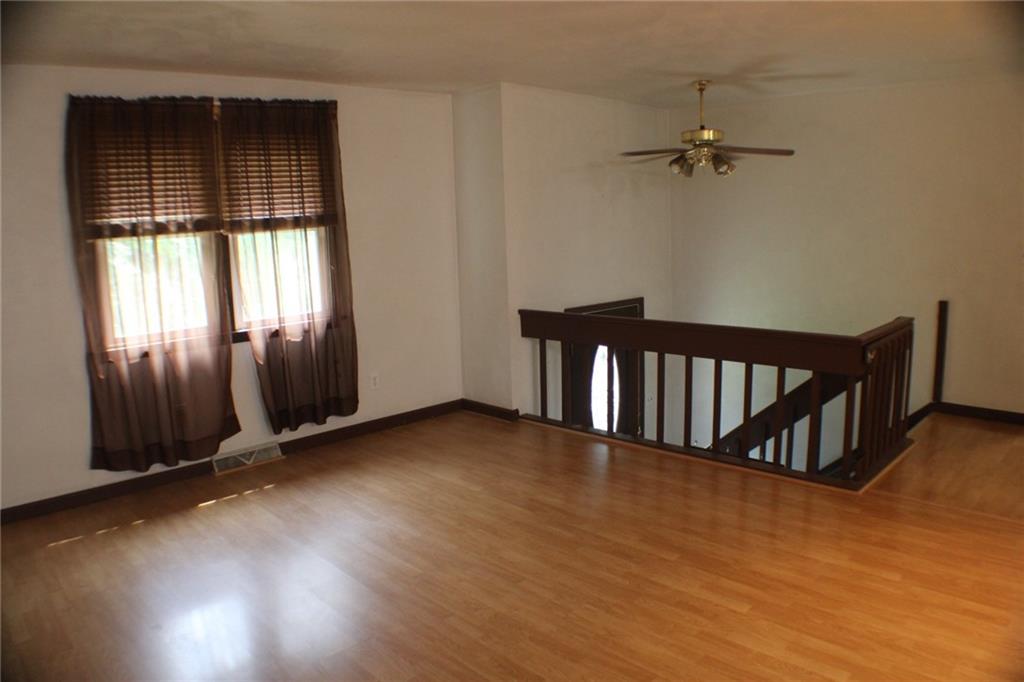1639 Deckers Point Road Marion Center, PA 15759 - Photo 4 of 26 an empty room with windows
