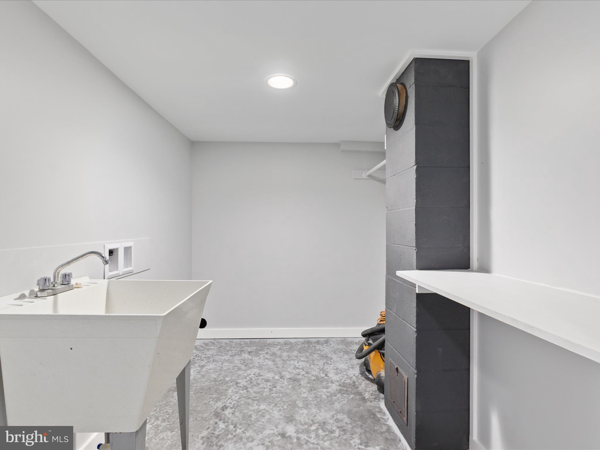 4834 Fort Valley Road Fort Valley, VA 22652 - Photo 21 of 45 Laundry room with laundry sink in basement