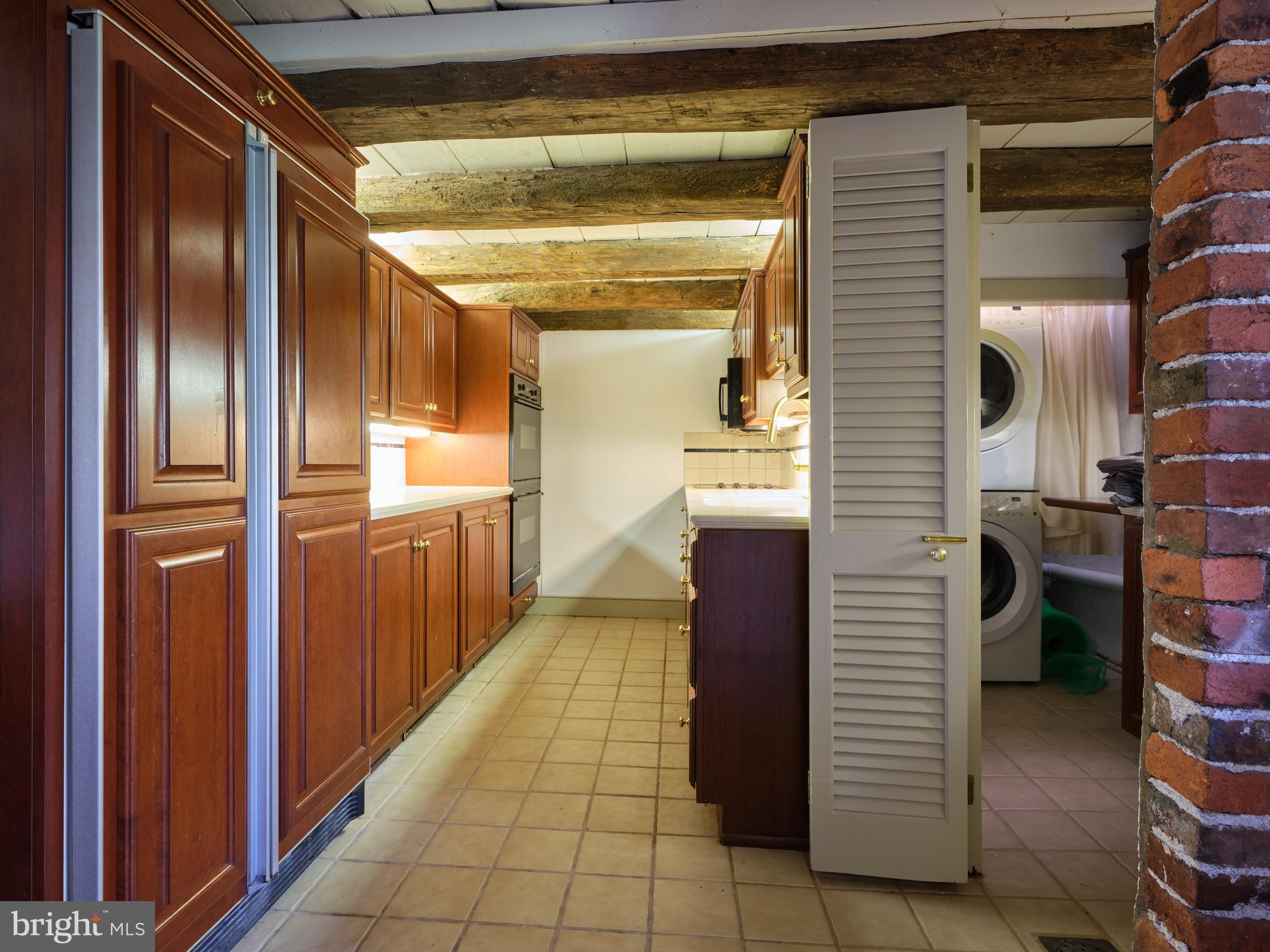 3501 Allentown Road Hatfield, PA 19440 - Photo 17 of 51 The cherry kitchen, laundry to the side