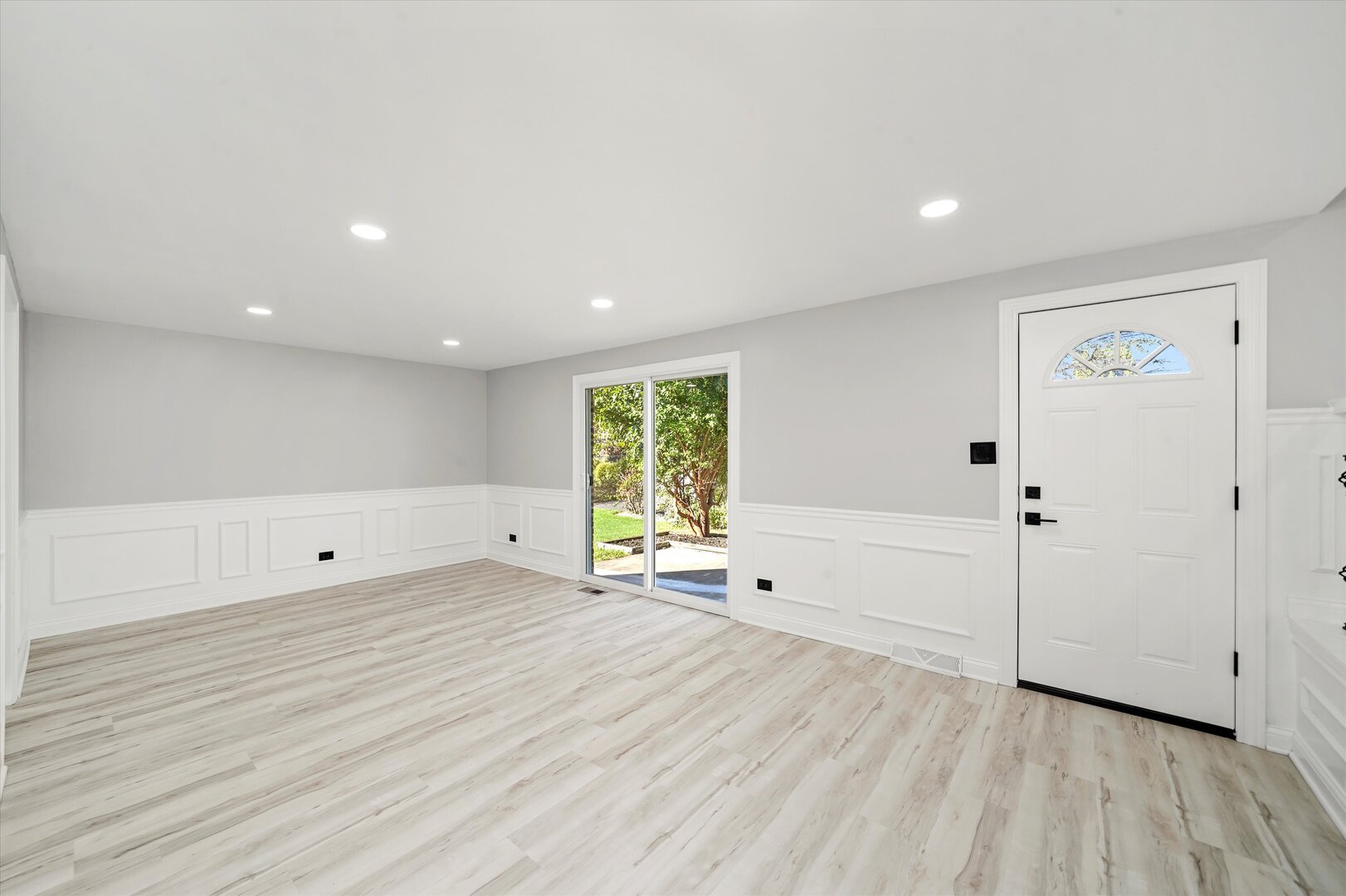 513 Chestnut Lane Beecher, IL 60401 - Photo 16 of 38 a view of an empty room with wooden floor and a window