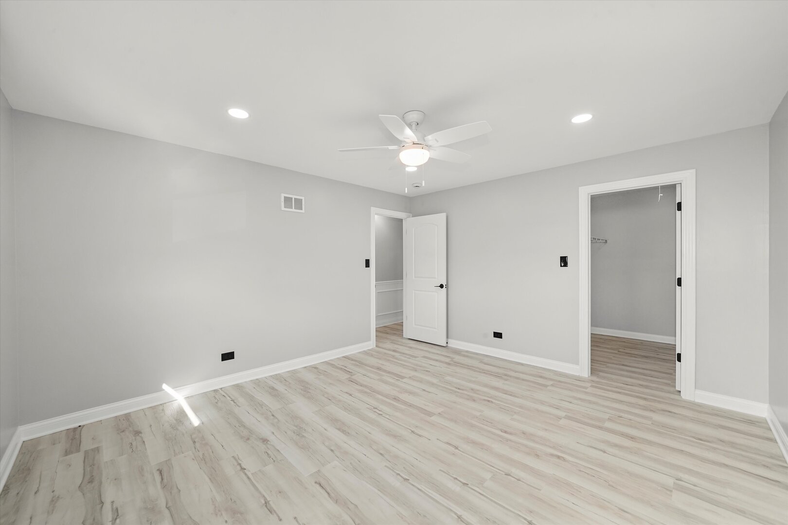 513 Chestnut Lane Beecher, IL 60401 - Photo 20 of 38 a view of an empty room with wooden floor