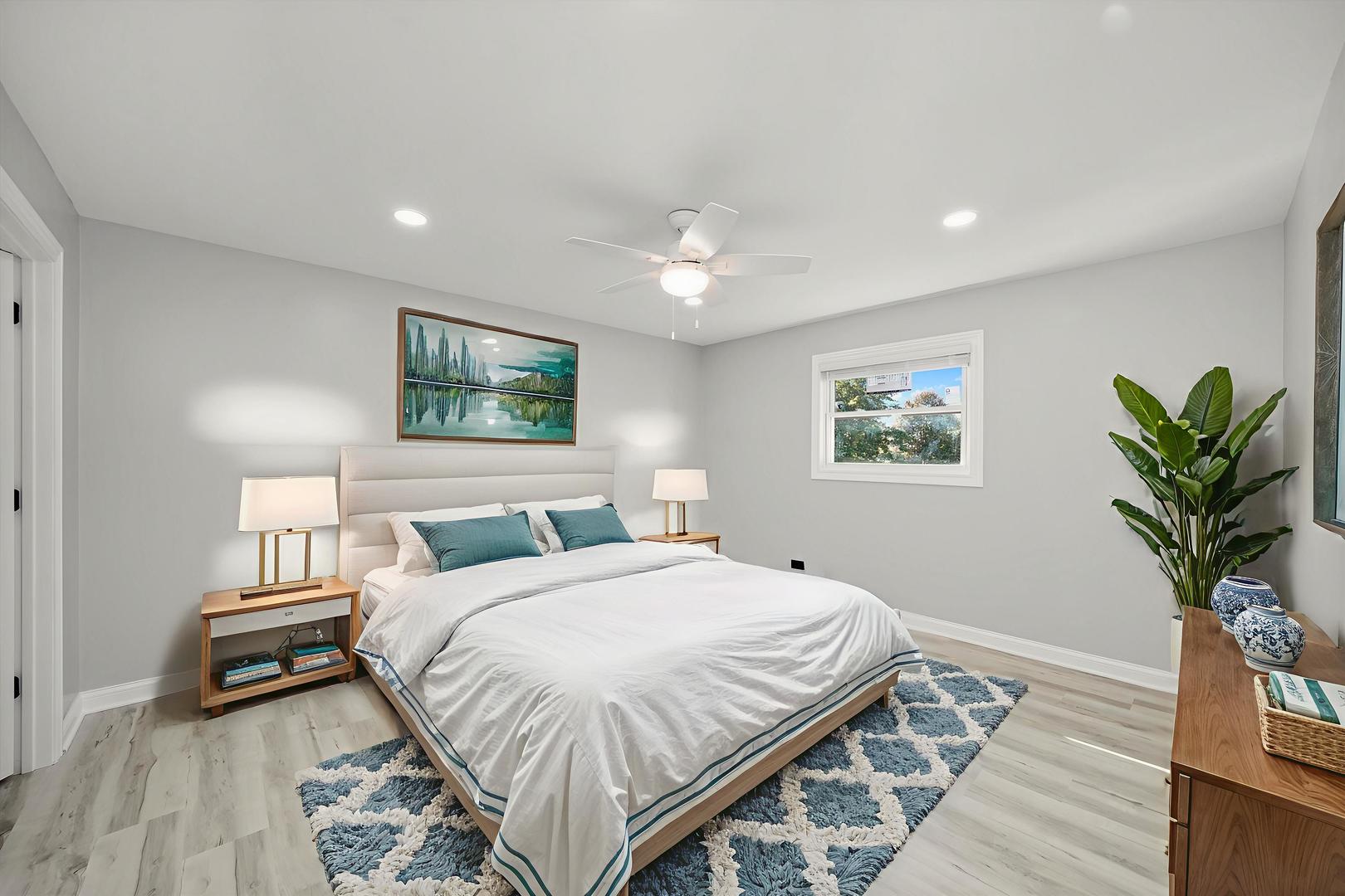 513 Chestnut Lane Beecher, IL 60401 - Photo 21 of 38 a bedroom with bed and a potted plant