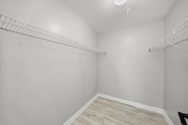 a view of a room with racks on the wall