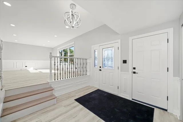 a view of a livingroom with wooden floor