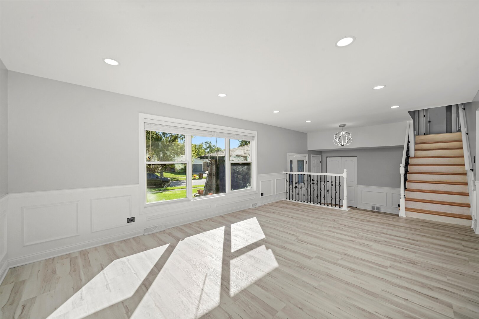 513 Chestnut Lane Beecher, IL 60401 - Photo 6 of 38 a view of a kitchen with wooden floor and a window