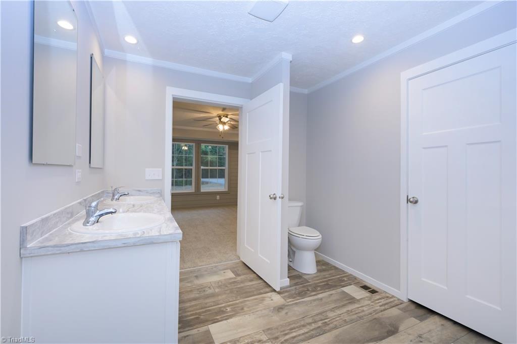 6201 Whites Chapel Road Staley, NC 27355 - Photo 21 of 28 Primary Bathroom's