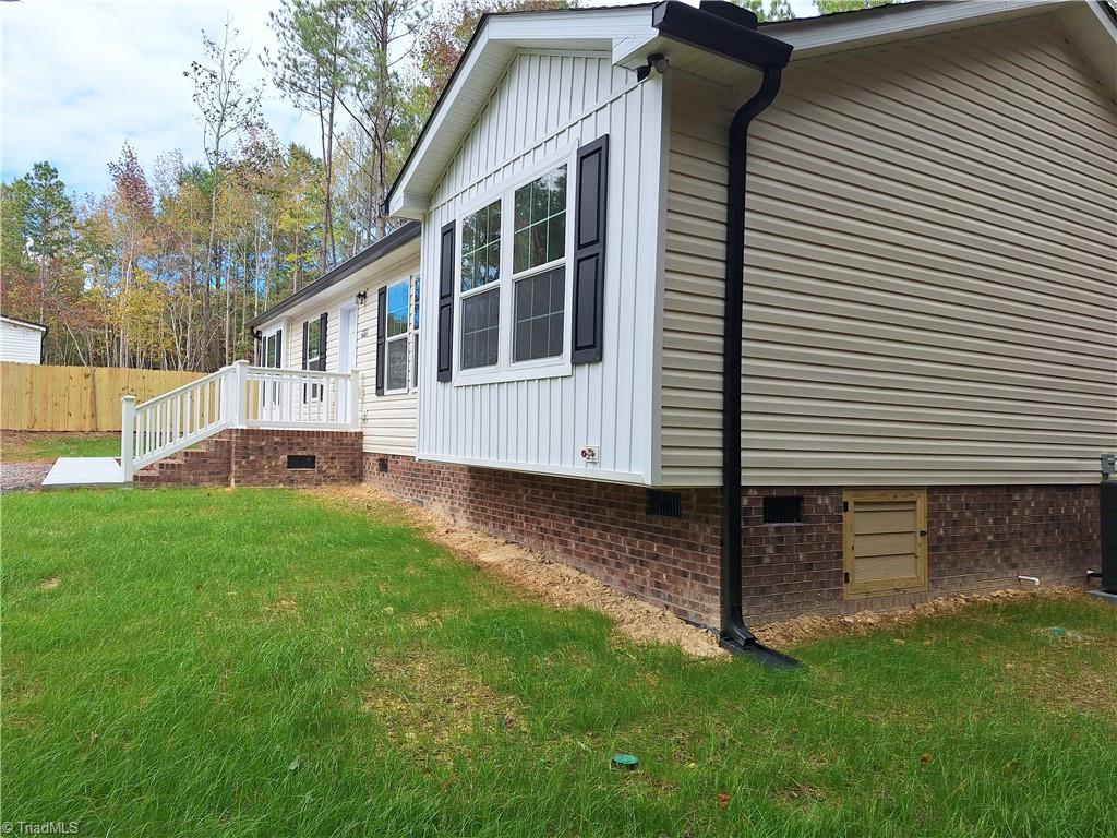 6201 Whites Chapel Road Staley, NC 27355 - Photo 5 of 28 Front - Side View