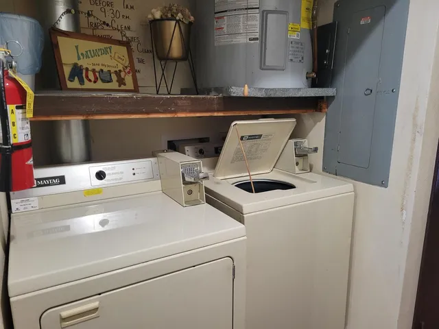 a utility room with dryer and washer