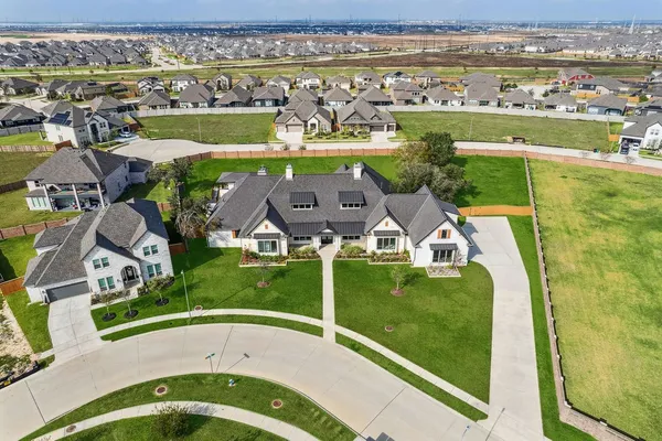 an aerial view of a house with a garden