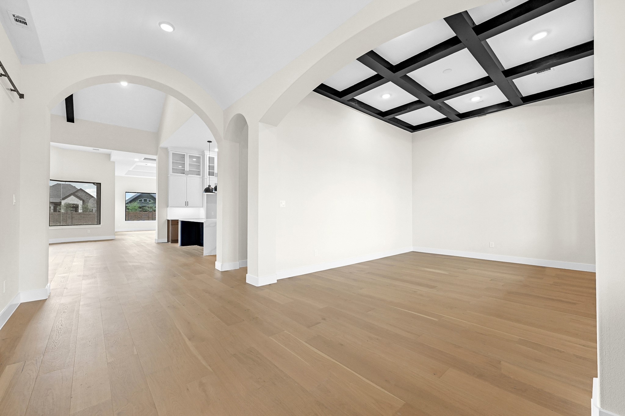 21230 Adriatic Run Drive Cypress, TX 77433 - Photo 11 of 50 a view of a livingroom with wooden floor and a ceiling fan