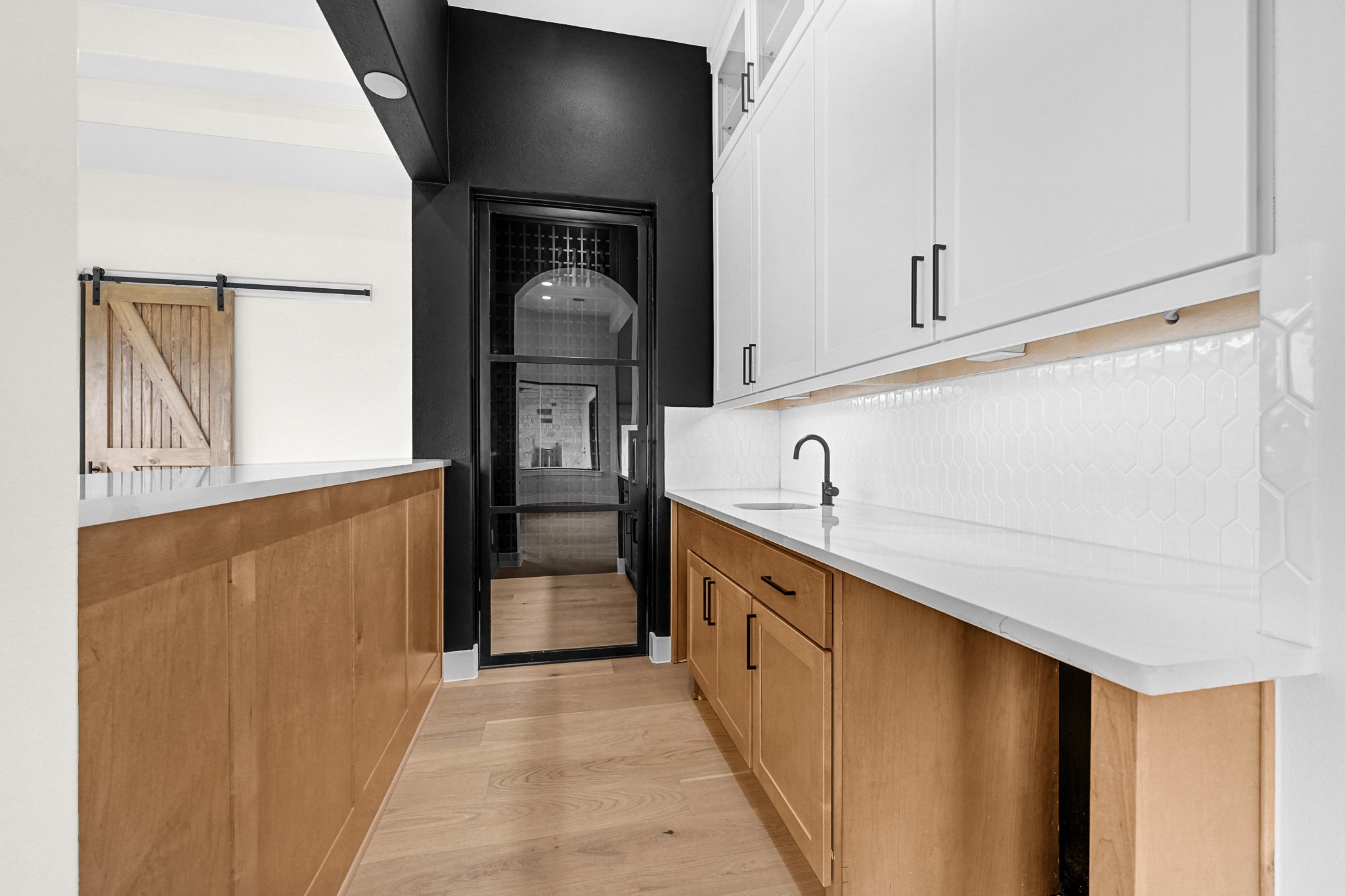 21230 Adriatic Run Drive Cypress, TX 77433 - Photo 15 of 50 a kitchen with stainless steel appliances a refrigerator and cabinets