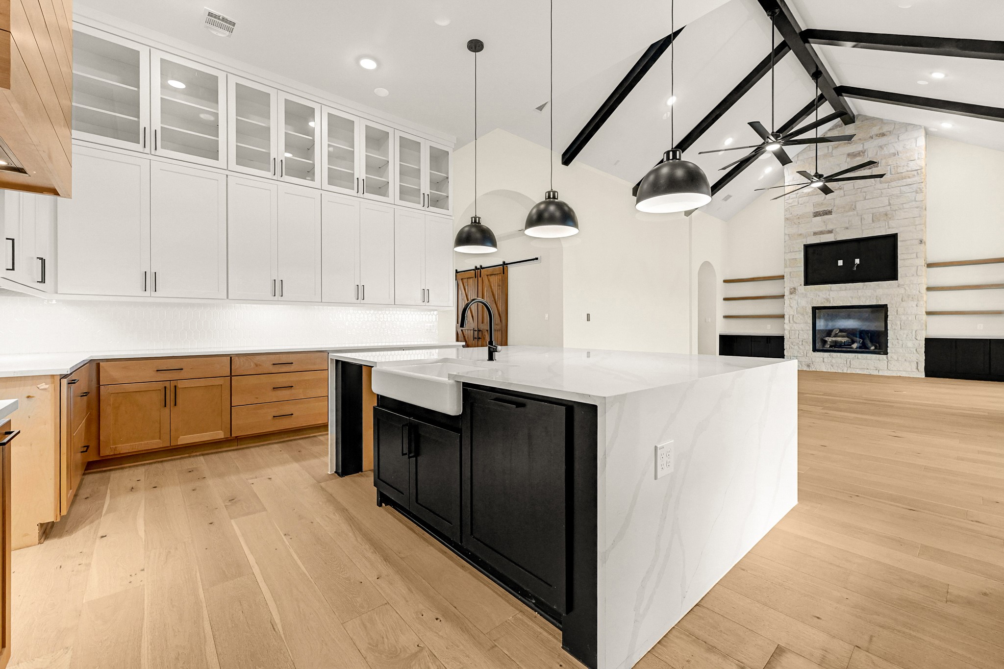 21230 Adriatic Run Drive Cypress, TX 77433 - Photo 21 of 50 a kitchen with stainless steel appliances kitchen island granite countertop a sink and cabinets