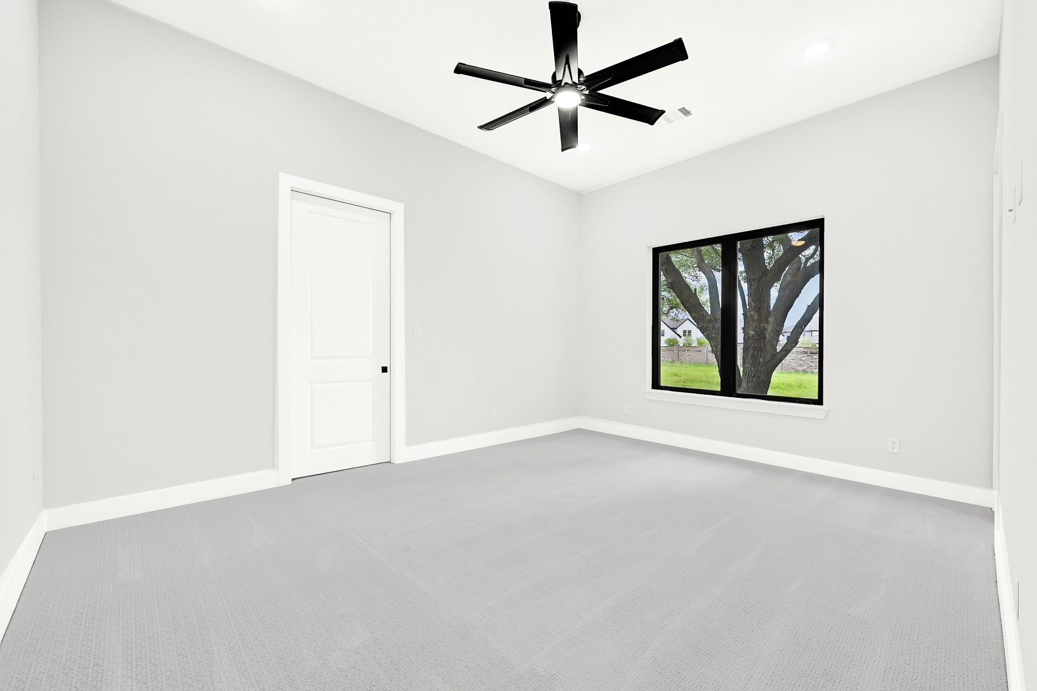 21230 Adriatic Run Drive Cypress, TX 77433 - Photo 24 of 50 an empty room with windows and fan