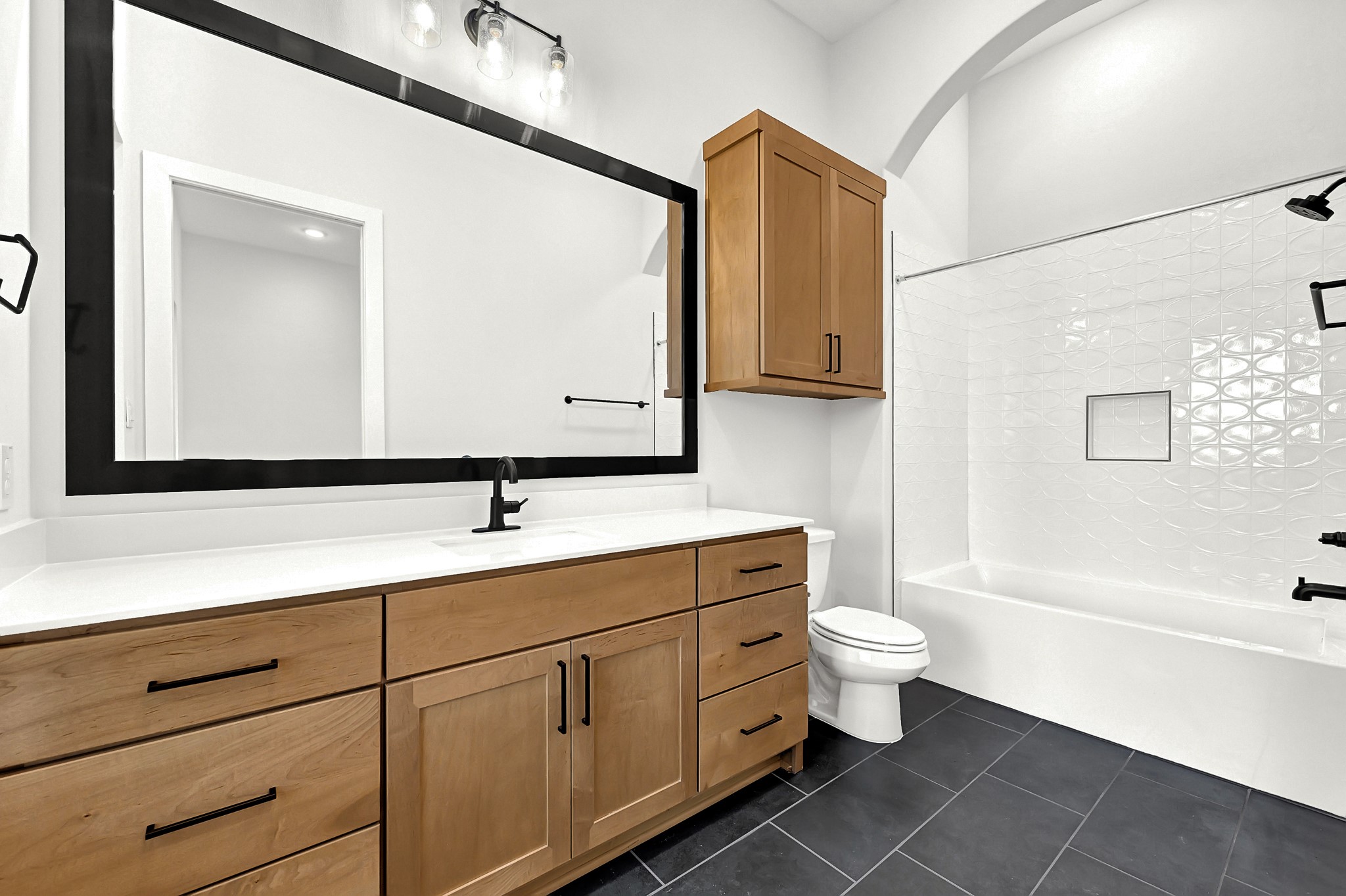 21230 Adriatic Run Drive Cypress, TX 77433 - Photo 25 of 50 a bathroom with a sink toilet and shower