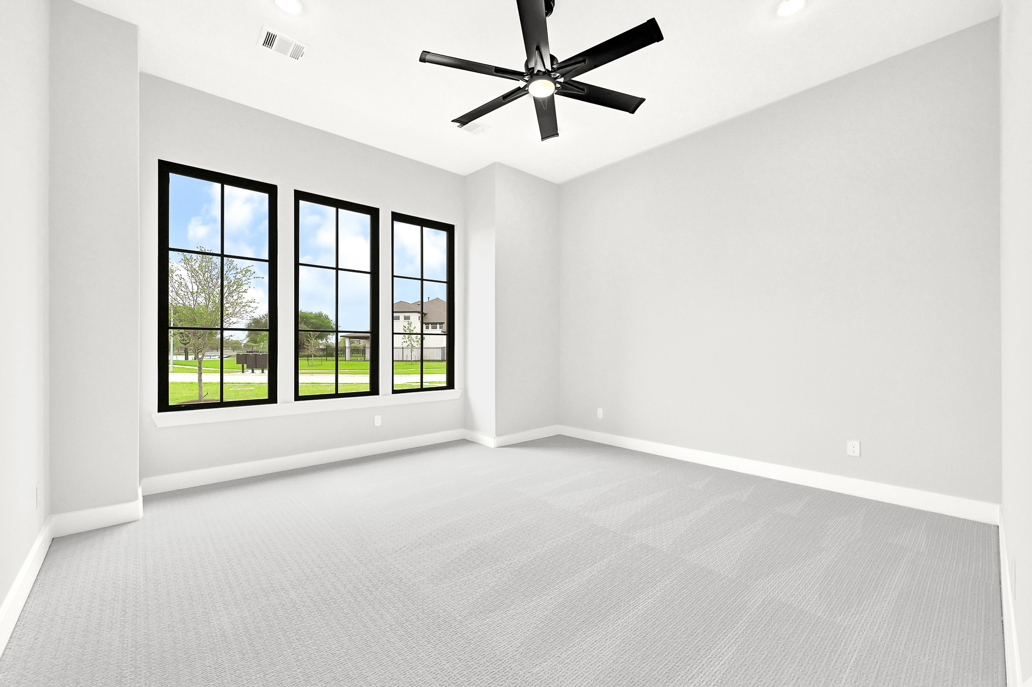 21230 Adriatic Run Drive Cypress, TX 77433 - Photo 26 of 50 a view of room with window and ceiling fan