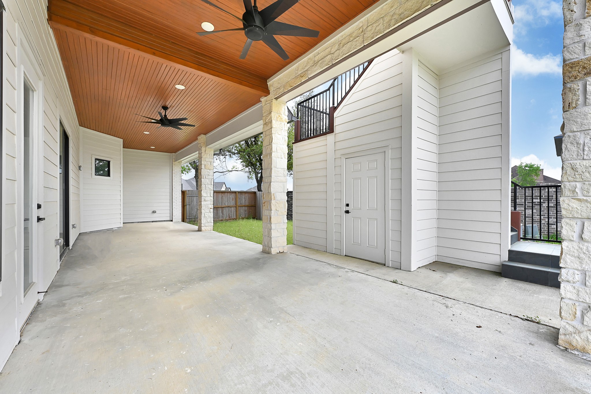 21230 Adriatic Run Drive Cypress, TX 77433 - Photo 36 of 50 a view of a porch with a table and chairs