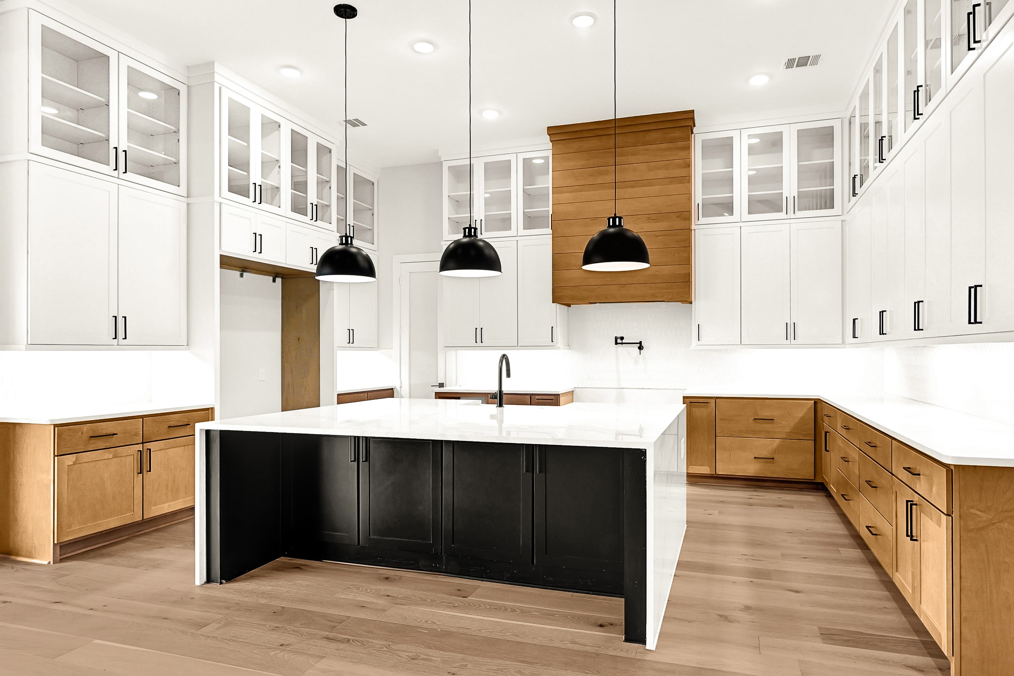 21230 Adriatic Run Drive Cypress, TX 77433 - Photo 8 of 50 a kitchen with stainless steel appliances kitchen island granite countertop a sink counter space and cabinets