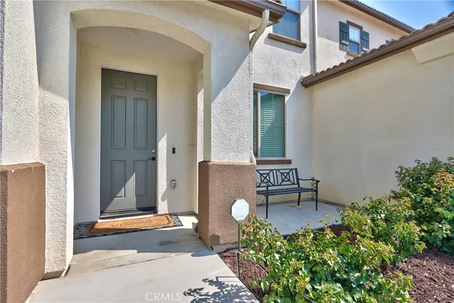 a large kitchen with stainless steel appliances granite countertop a lot of counter space and a sink